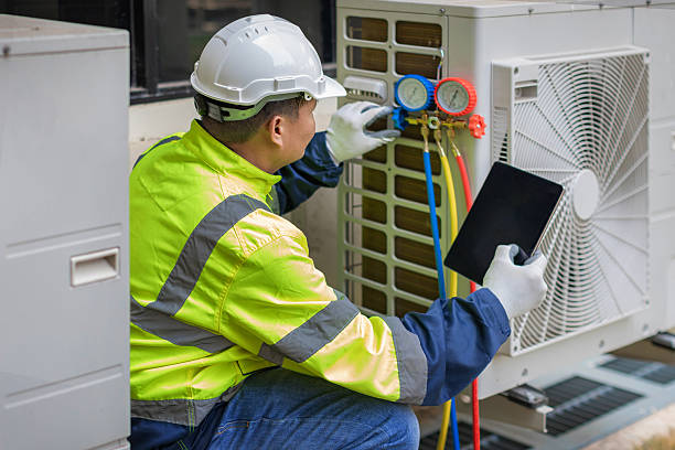 Professional Hvac Maintenance technician working in Fort Myers Beach, FL